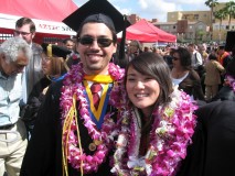 two graduate students at graduation