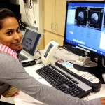 Lead researcher, Aarti Nair, a student in the SDSU/UCSD Joint Doctoral Program in Clinical Psychology reviews MRI scans of children with autism.