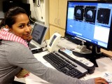 Lead researcher, Aarti Nair, a student in the SDSU/UCSD Joint Doctoral Program in Clinical Psychology reviews MRI scans of children with autism.